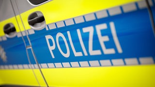 Polizei Aufschrift an einem Wagen