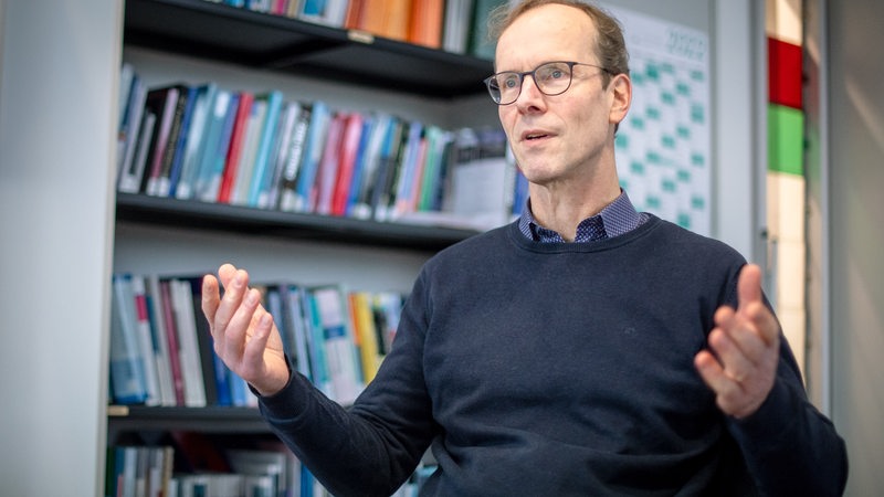 Hajo Zeeb, an epidemiologist at the Leibniz Institute for Prevention Research and Epidemiology in Bremen, is sitting in his office.