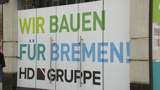Klebefolie mit der Aufschrift "Wir bauen für Bremen"